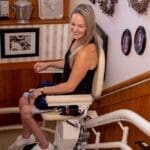 Woman on a stair lift